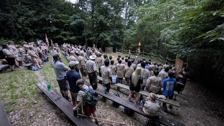 Troop 58 Scouts at a summer camp campfire ceremony