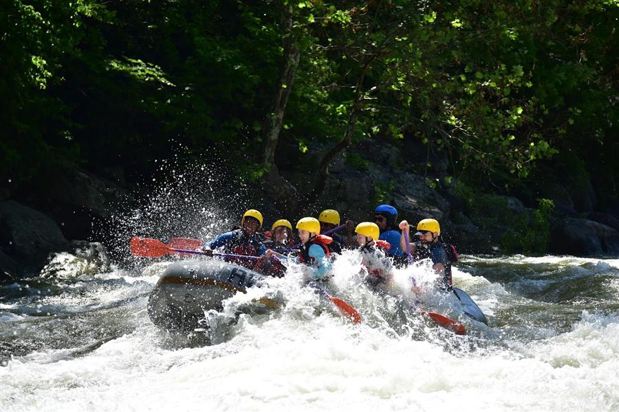 Troop 58 Scouts whitewater rafting through rapids